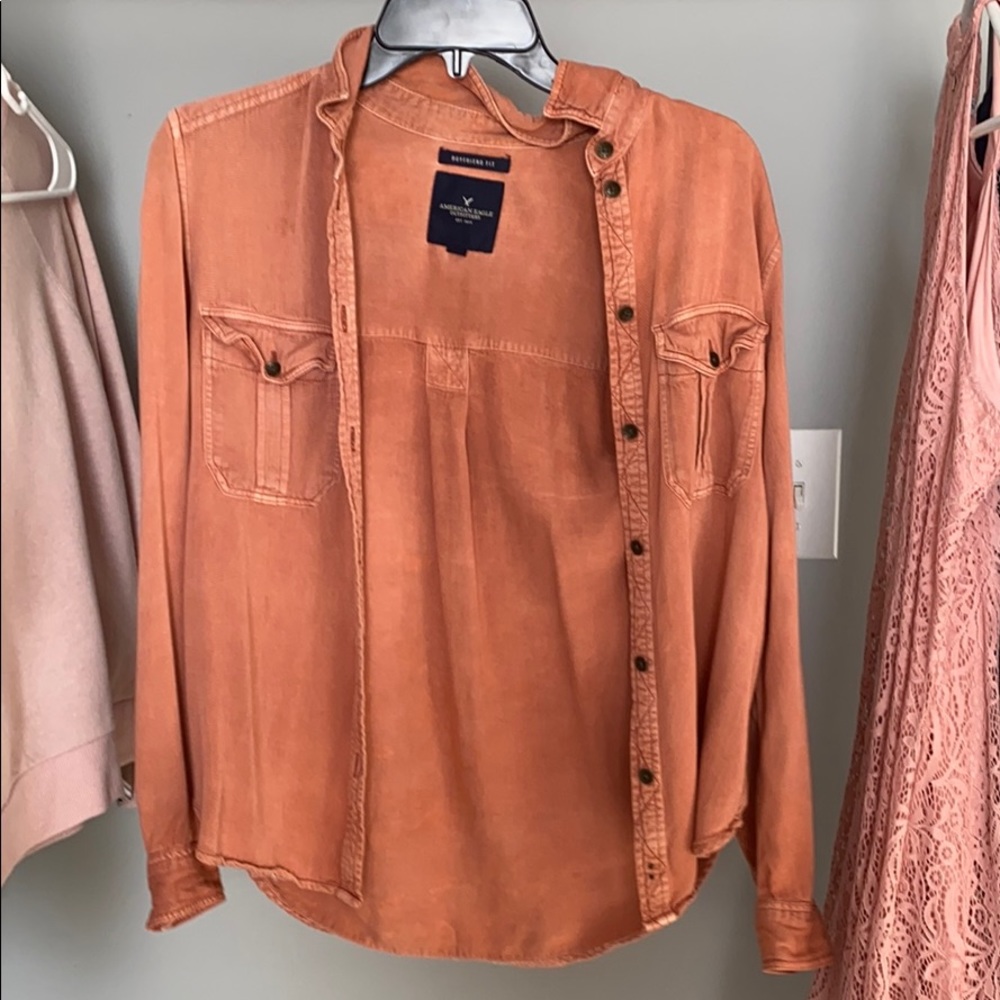 Orange button up top